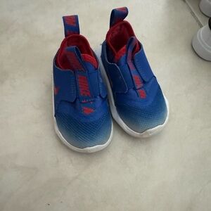 Red white and blue Nikes
